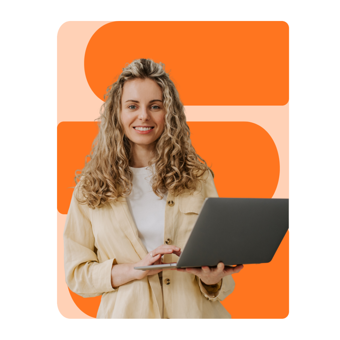 A smiling woman with curly blonde hair holds a laptop while standing in front of an orange and peach abstract background, representing confident learners participating in cyber awareness training. A smiling woman with curly blonde hair holds a laptop while standing in front of an orange and peach abstract background, representing confident learners participating in cyber awareness training.