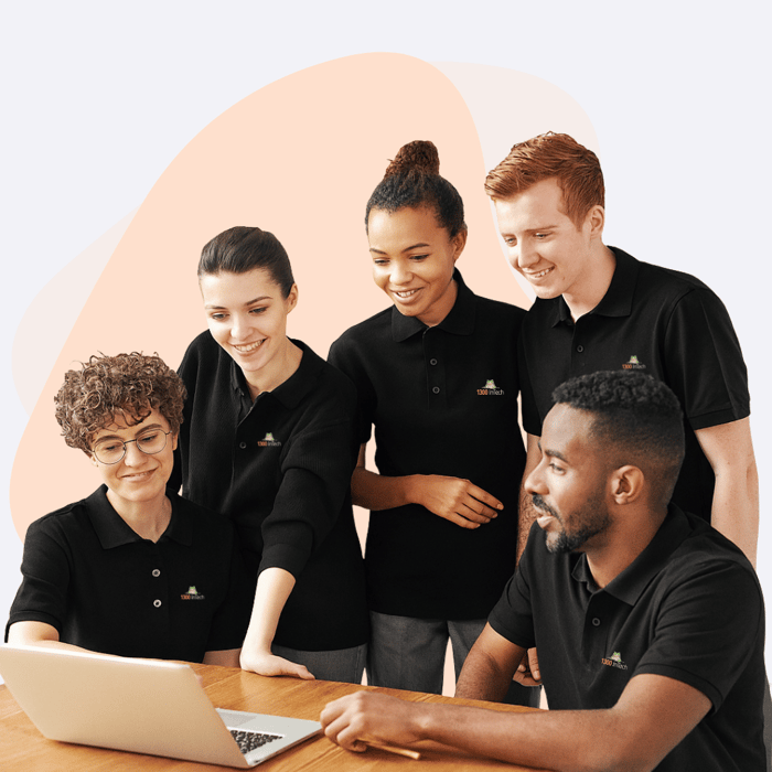 Diverse tech professionals reviewing systems together, representing proactive managed support and scalable IT solutions