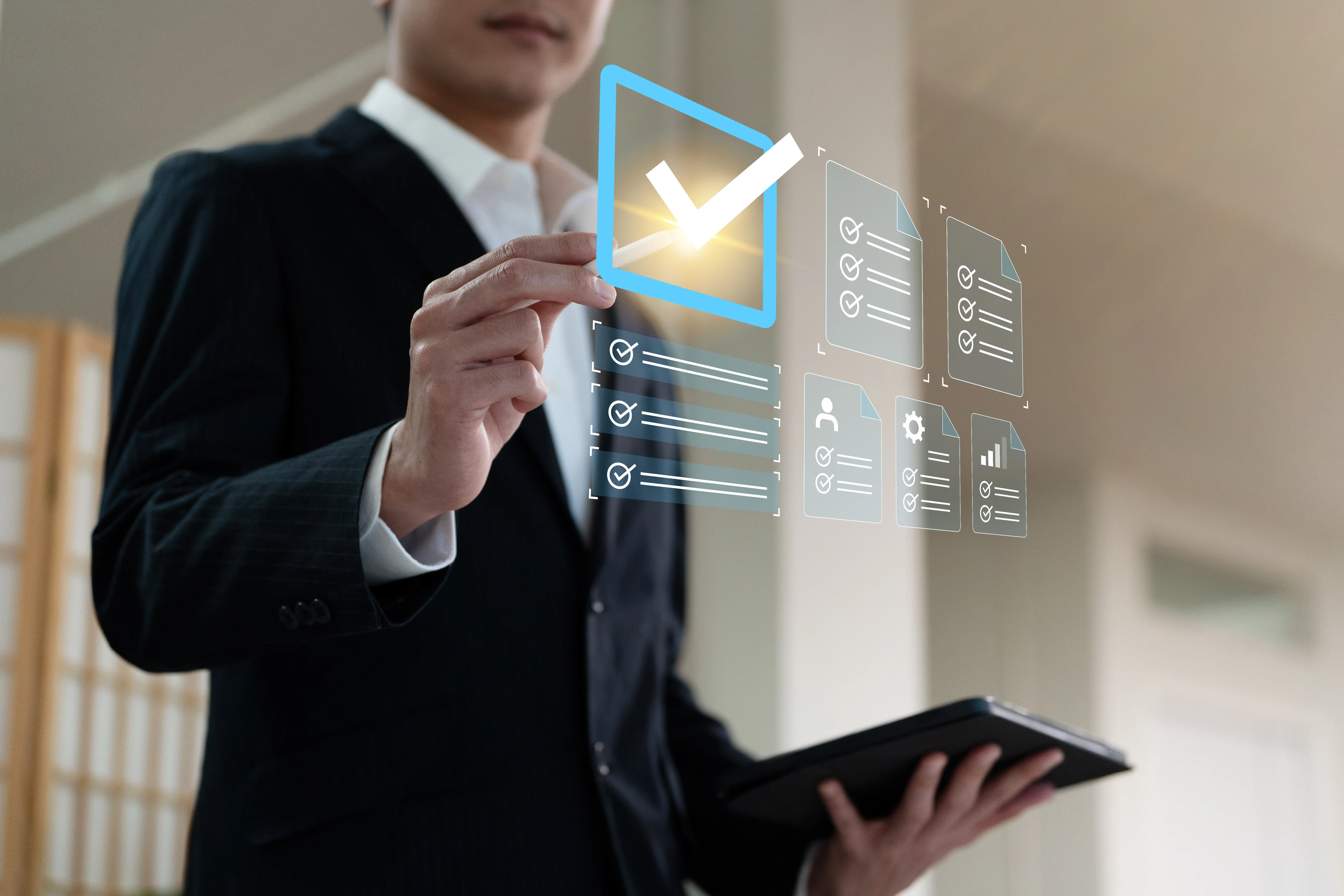 AI agents for business: a small business owner with a tablet approving an AI agent’s checklist before any task goes ahead